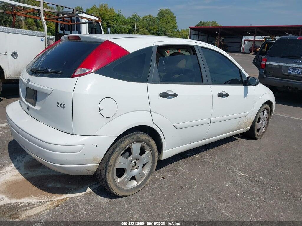 3FAHP37343R102752 2003 FORD FOCUS photo no. 4