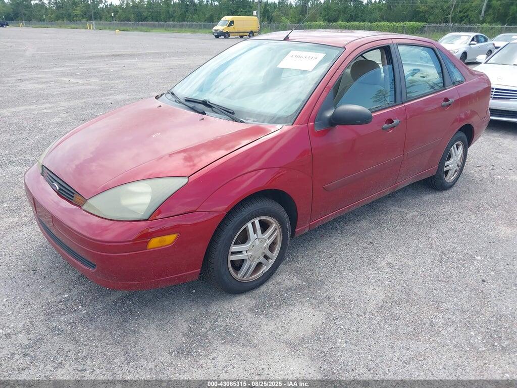 1FAFP38Z74W108697 2004 FORD FOCUS photo no. 2
