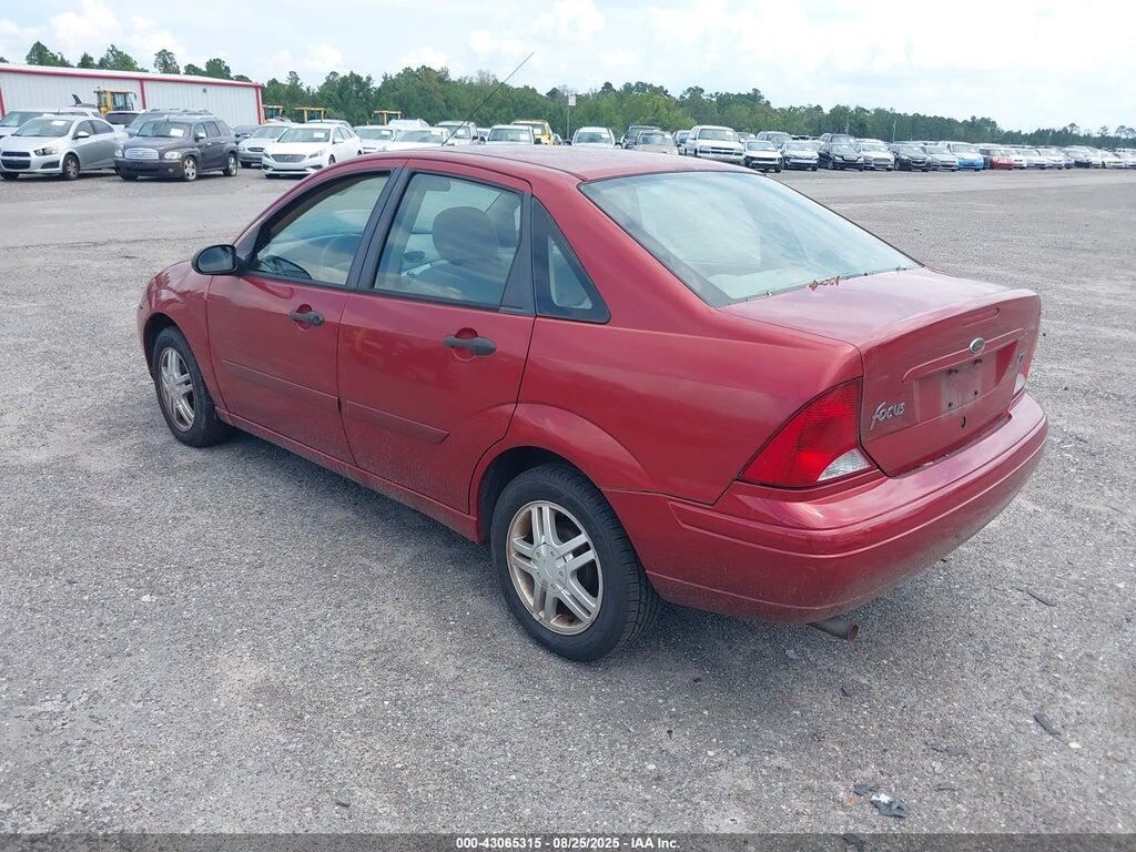 1FAFP38Z74W108697 2004 FORD FOCUS photo no. 3
