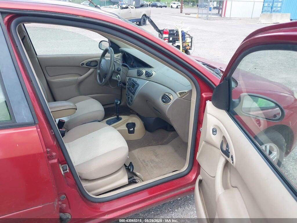 1FAFP38Z74W108697 2004 FORD FOCUS photo no. 5