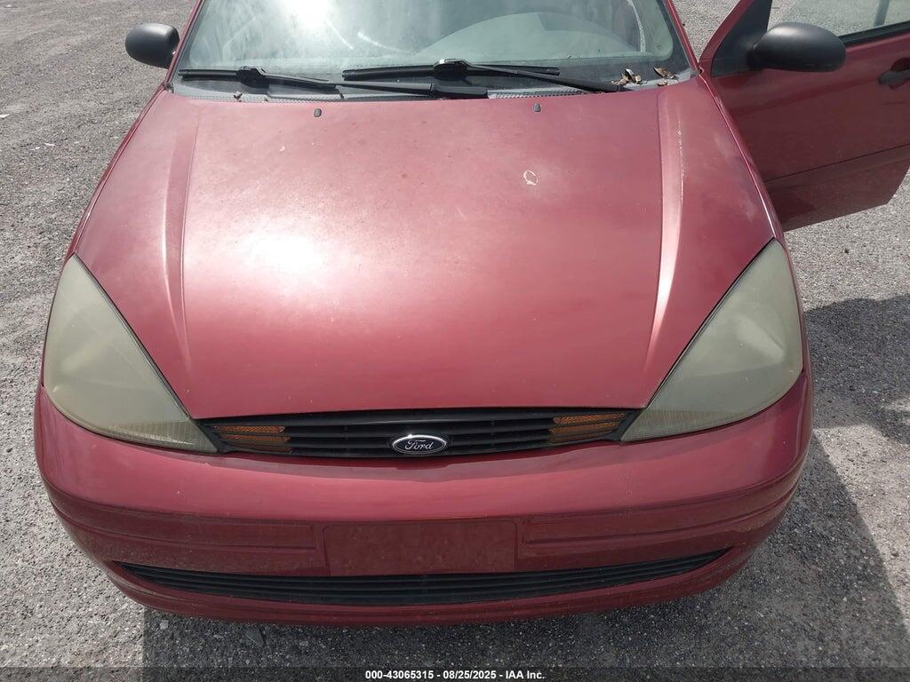 1FAFP38Z74W108697 2004 FORD FOCUS photo no. 6