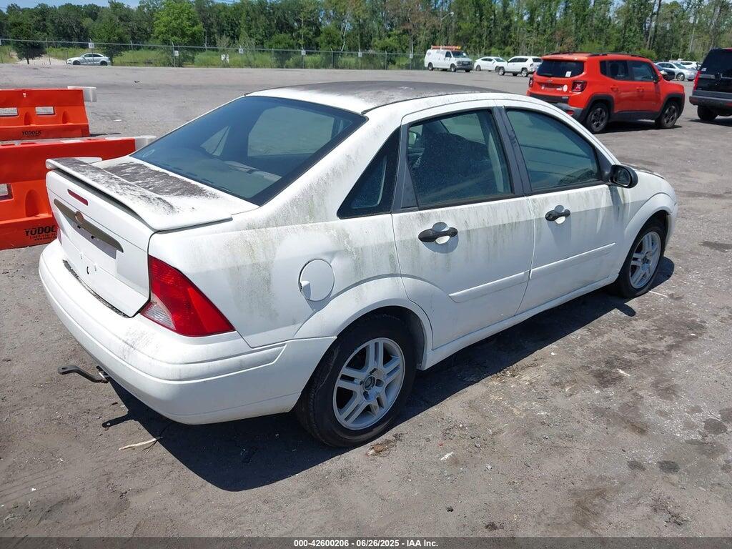 1FAFP3434YW125500 2000 FORD FOCUS photo no. 4