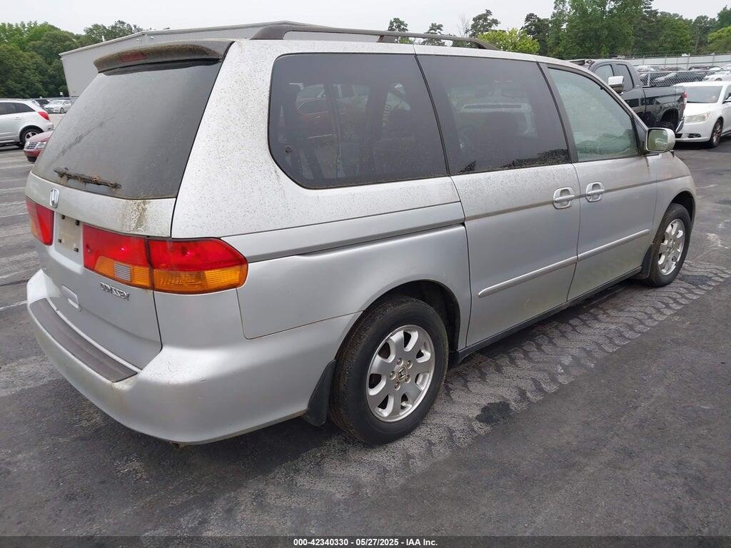 5FNRL18634B042571 2004 HONDA ODYSSEY photo no. 4