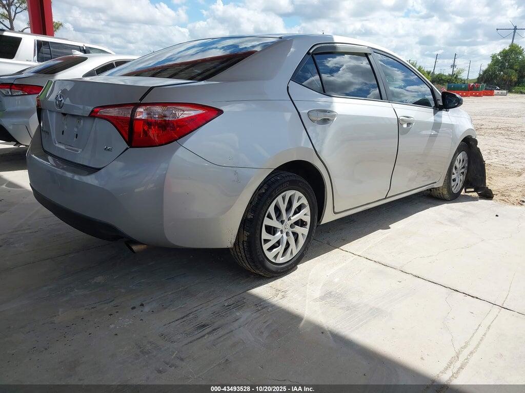 5YFBURHE9JP766222 2018 TOYOTA COROLLA photo no. 4