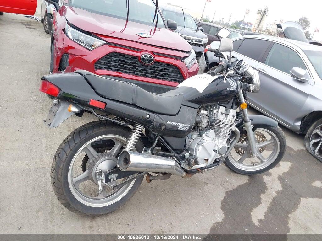 JH2RC3815SM300049 1995 HONDA CB750 photo no. 4