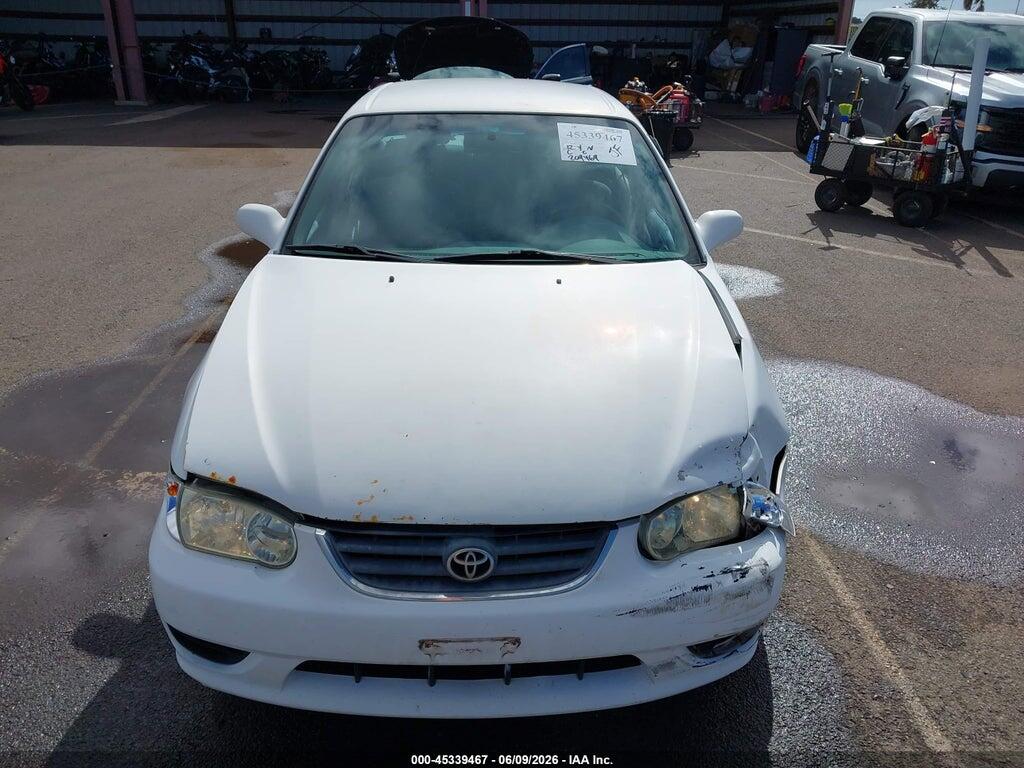 1NXBR12E12Z565619 2002 TOYOTA COROLLA photo no. 12