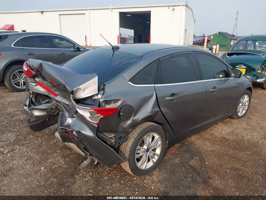 1FAHP3H21CL437861 2012 FORD FOCUS photo no. 4