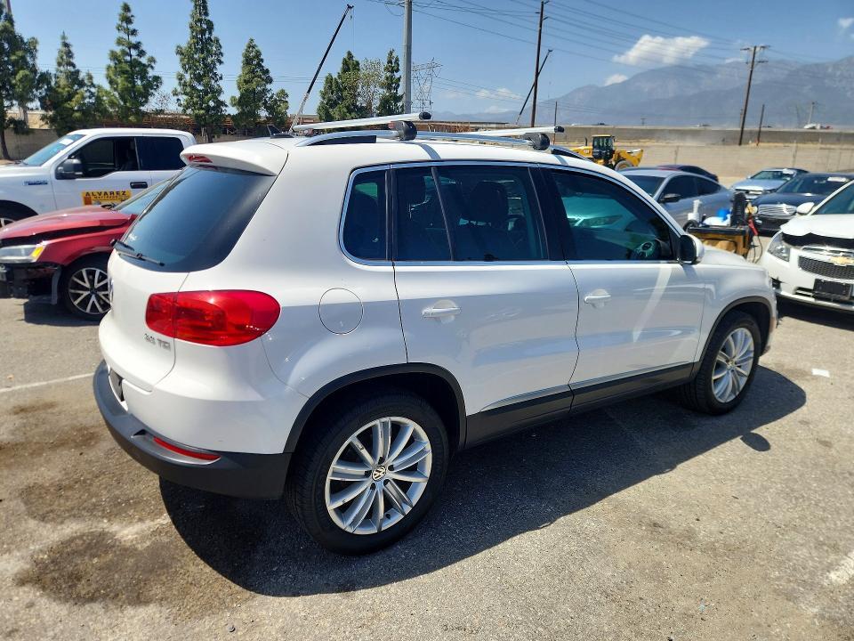 2014 VOLKSWAGEN TIGUAN S — Фото 3 из 12
