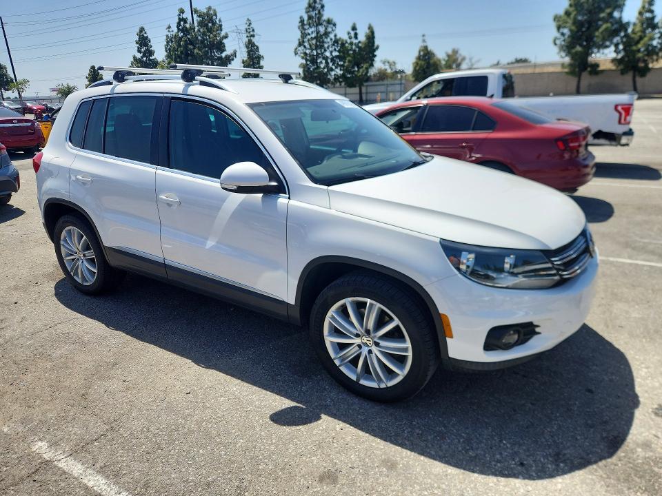 2014 VOLKSWAGEN TIGUAN S — Фото 4 из 12