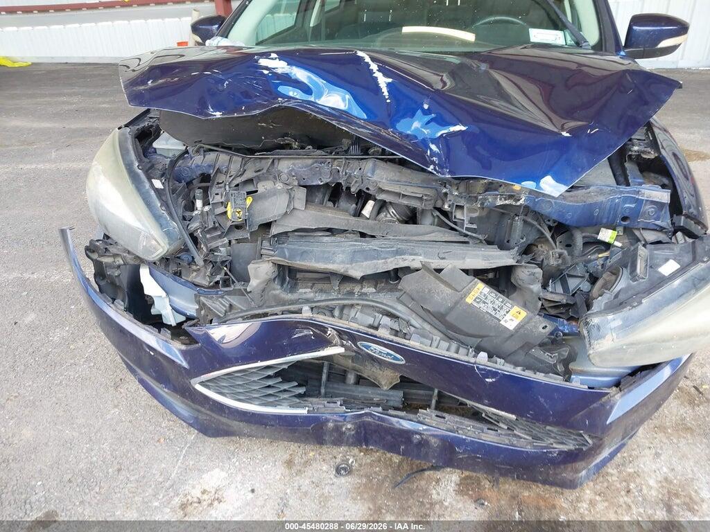1FADP3K23GL321817 2016 FORD FOCUS photo no. 12