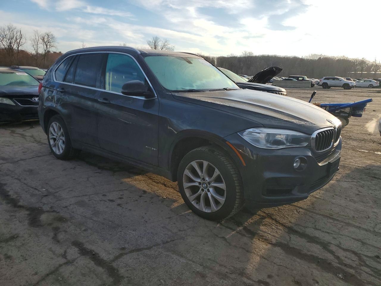 2015 BMW X5 XDRIVE35I — Фото 4 из 13