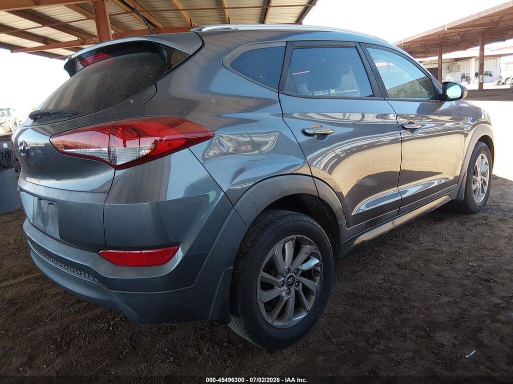 KM8J33A48GU180812 2016 HYUNDAI TUCSON photo no. 4