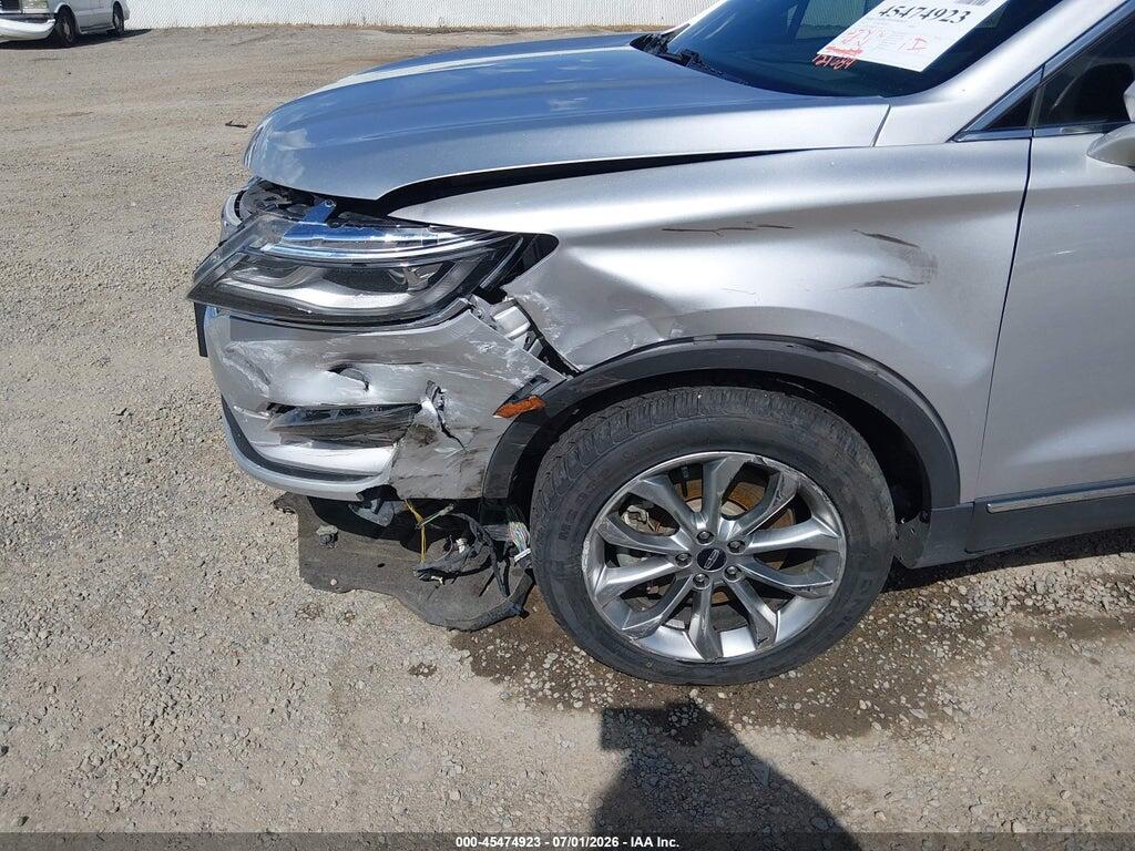 5LMCJ2D98HUL71032 2017 LINCOLN MKC photo no. 6
