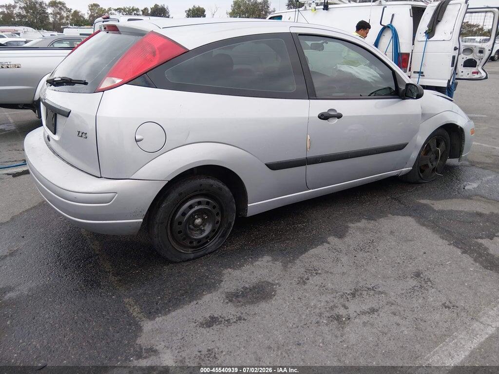 3FAFP31Z93R141633 2003 FORD FOCUS photo no. 4