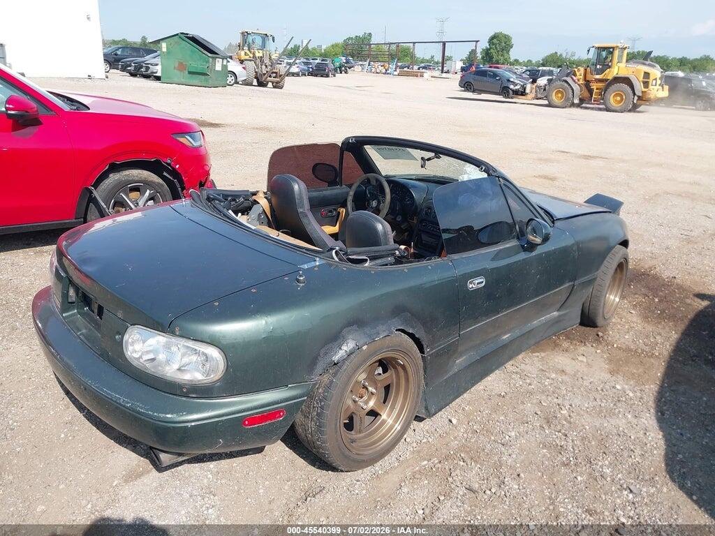 JM1NA3539V0729418 1997 MAZDA MX-5 MIATA photo no. 4