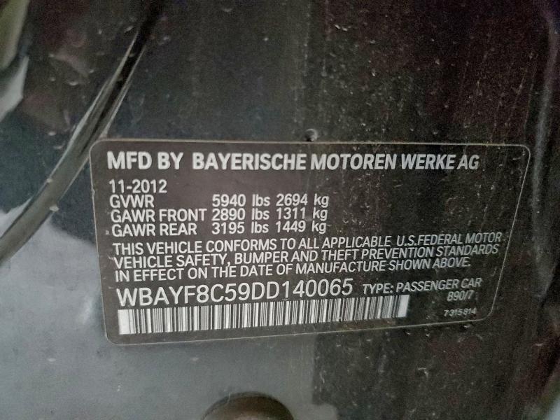 2013 BMW 750 LXI — Фото 12 из 12
