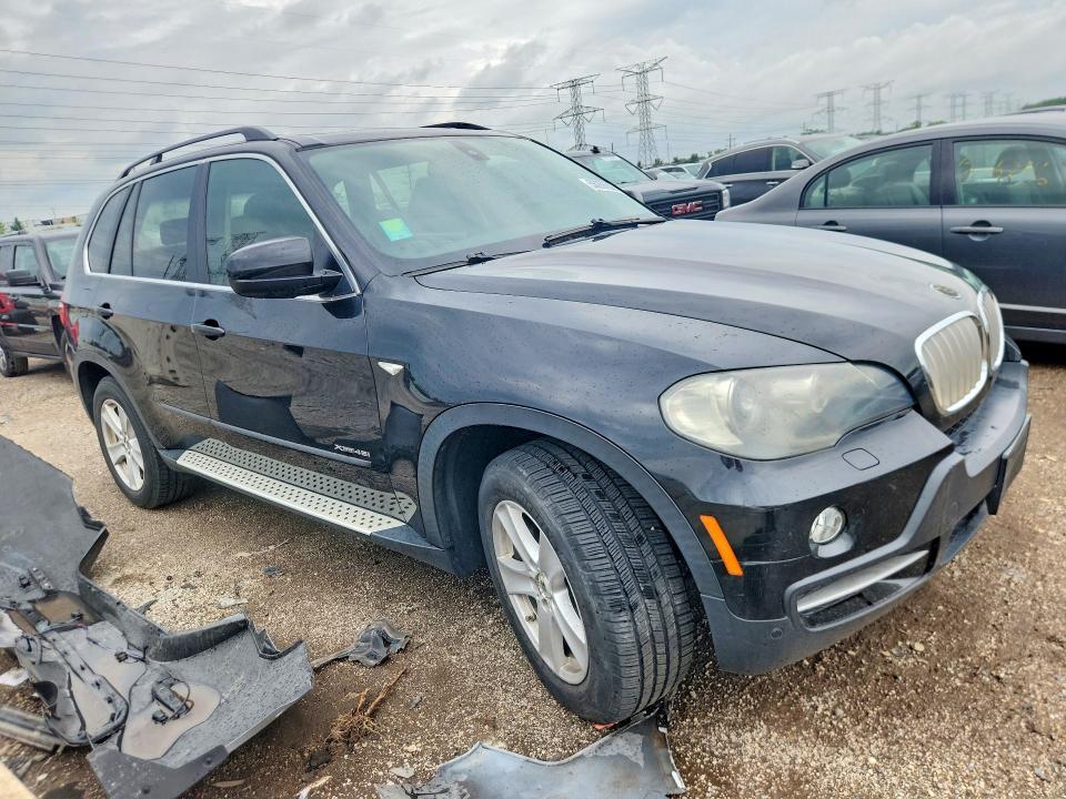 2010 BMW X5 XDRIVE48I — Фото 4 из 12