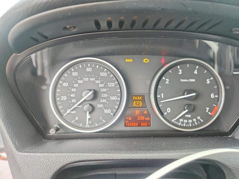 2010 BMW X5 XDRIVE48I — Фото 9 из 12