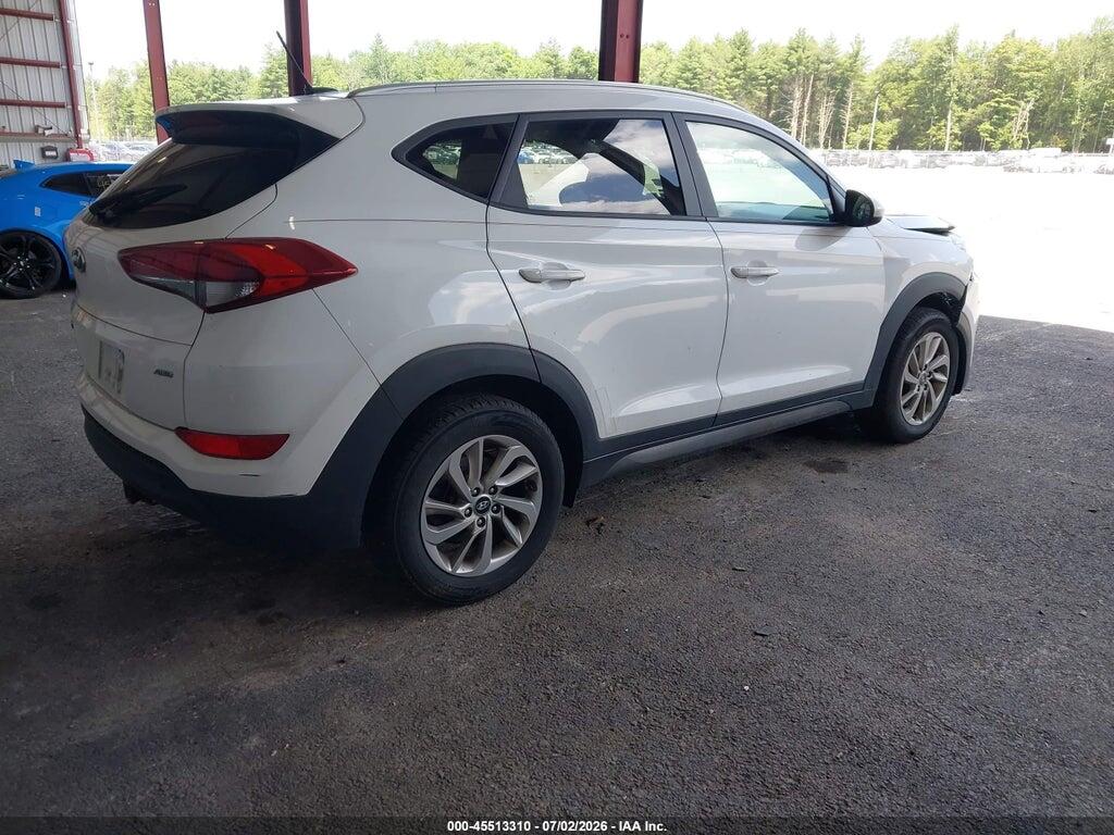 KM8J3CA48GU100294 2016 HYUNDAI TUCSON photo no. 4