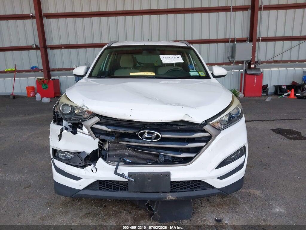 KM8J3CA48GU100294 2016 HYUNDAI TUCSON photo no. 6