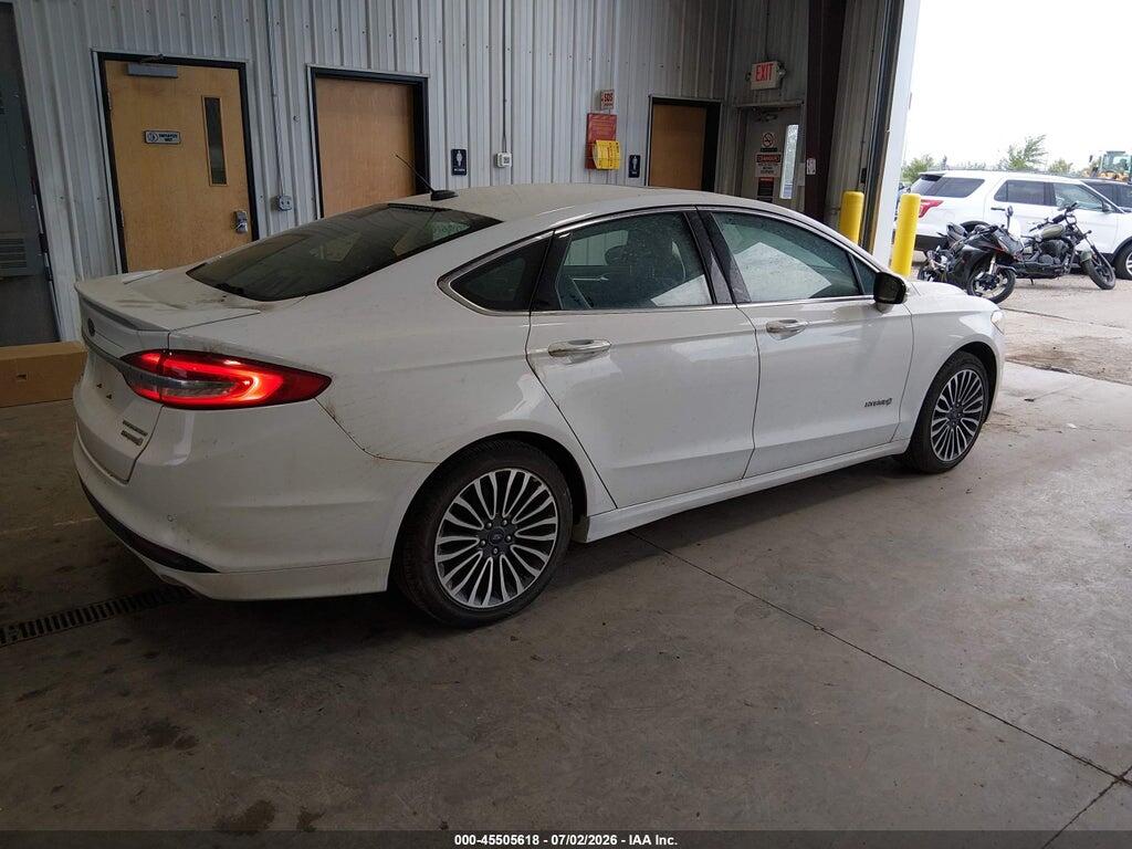 3FA6P0RU5HR323201 2017 FORD FUSION HYBRID photo no. 4