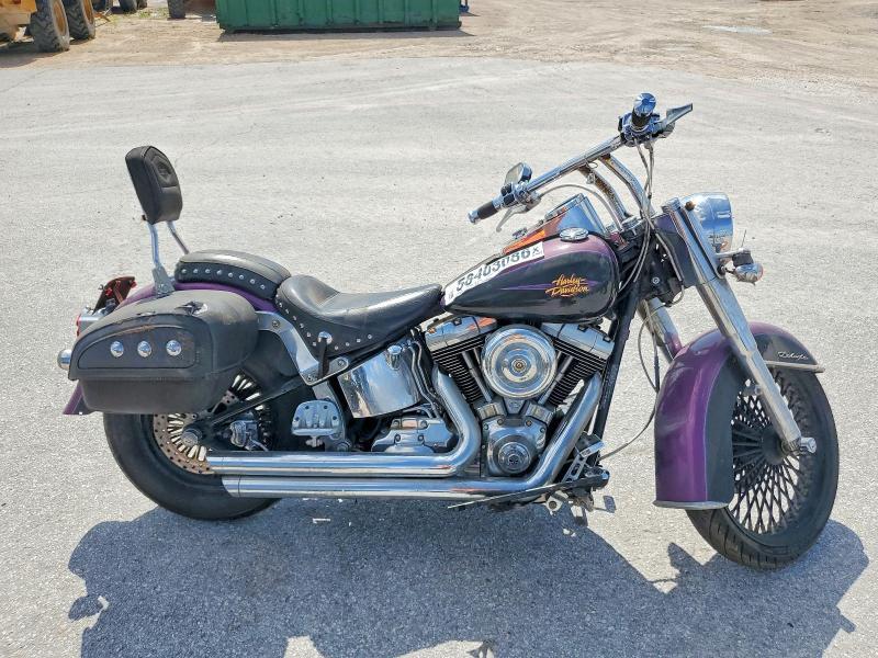 2011 HARLEY-DAVIDSON FLSTN 1HD1JD518BB027737