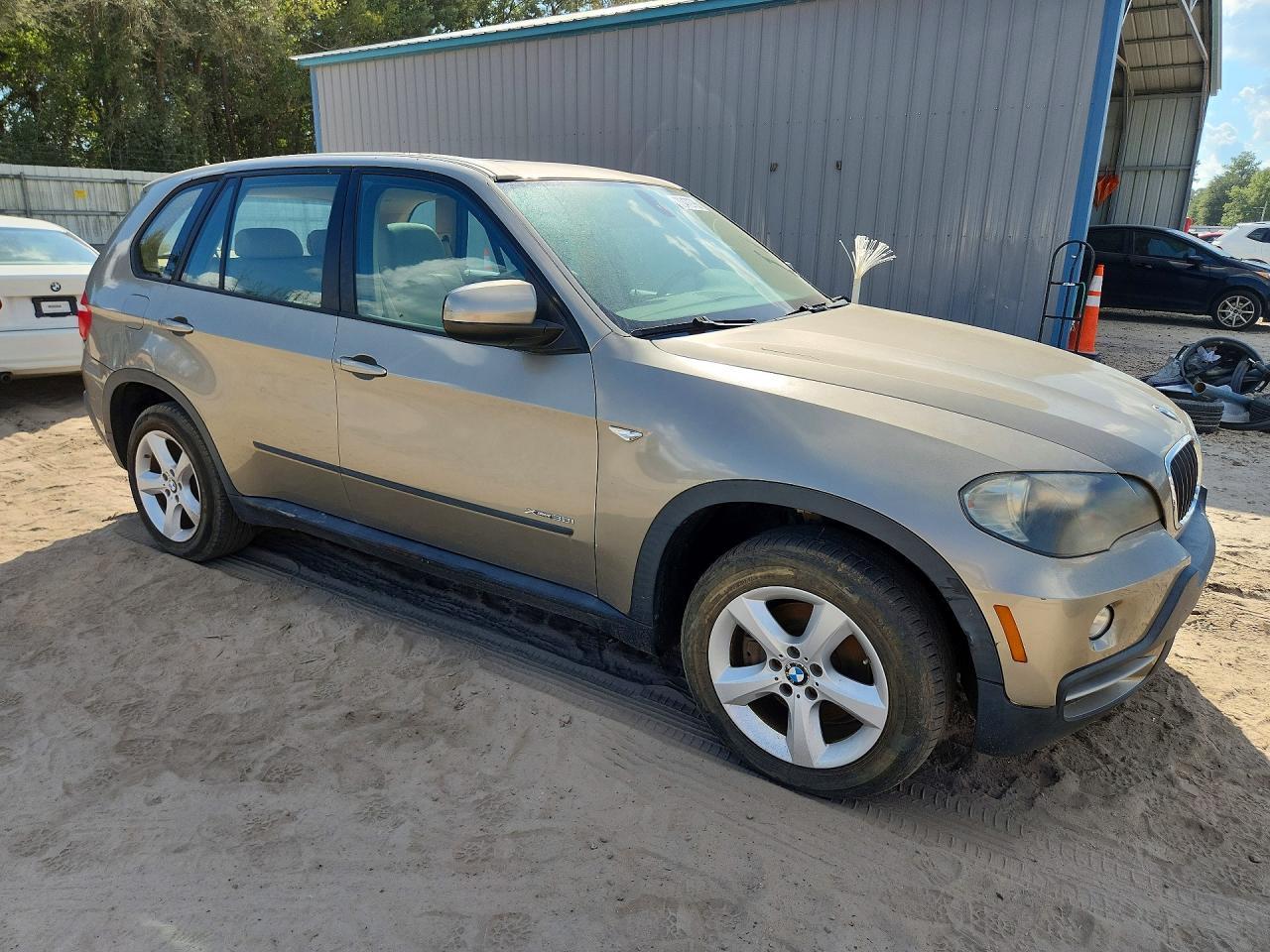 2010 BMW X5 XDRIVE30I — Фото 4 из 13