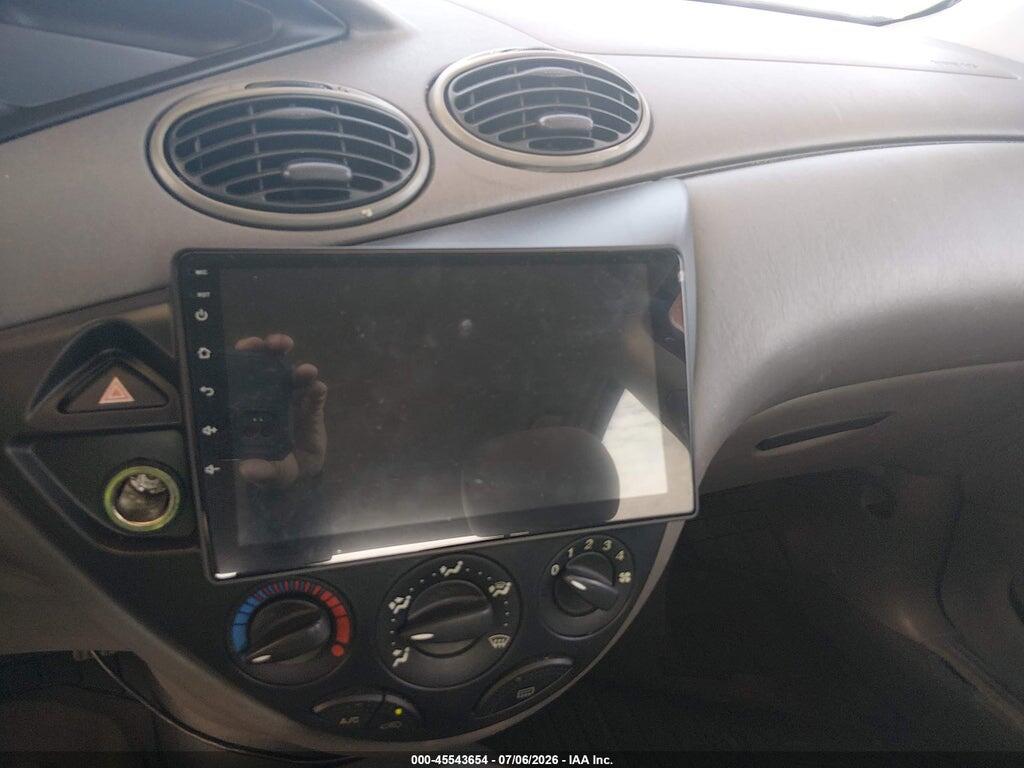 1FAFP33P44W154719 2004 FORD FOCUS photo no. 12