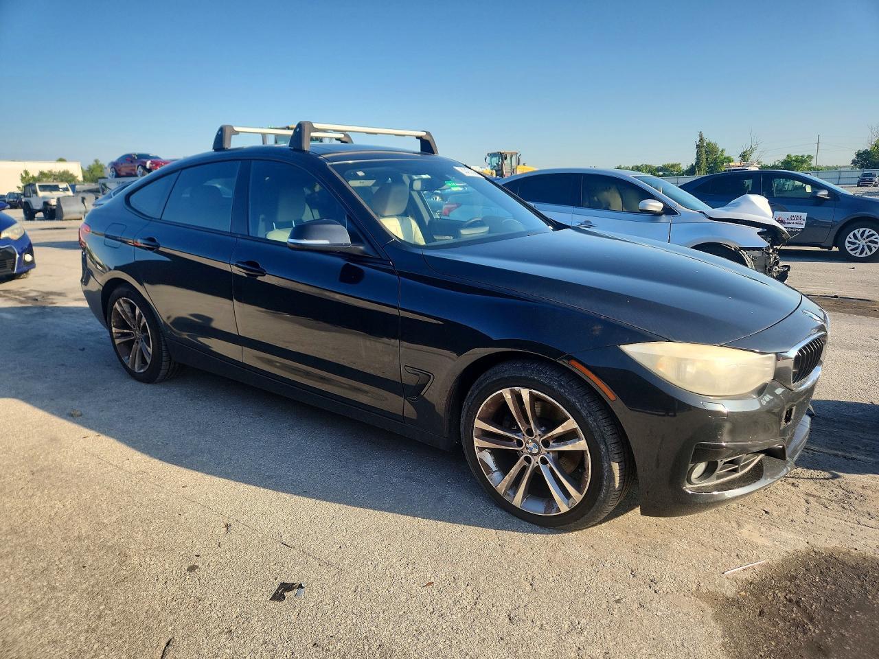 2015 BMW 328 XIGT — Фото 4 из 12