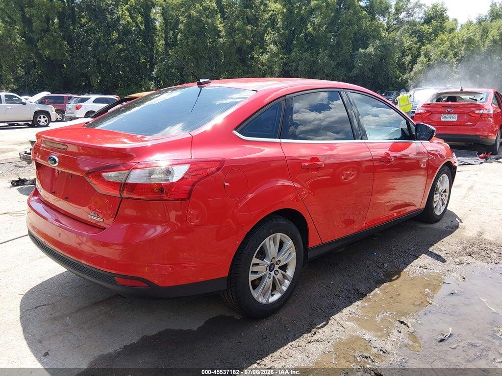 1FAHP3H25CL386705 2012 FORD FOCUS photo no. 4