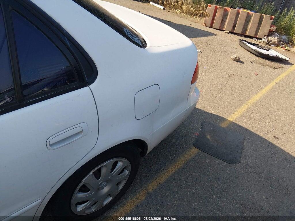 1NXBR12EX2Z607883 2002 TOYOTA COROLLA photo no. 6