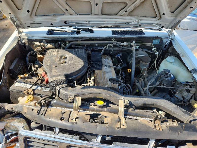 1995 NISSAN TRUCK E/XE — Фото 11 из 12