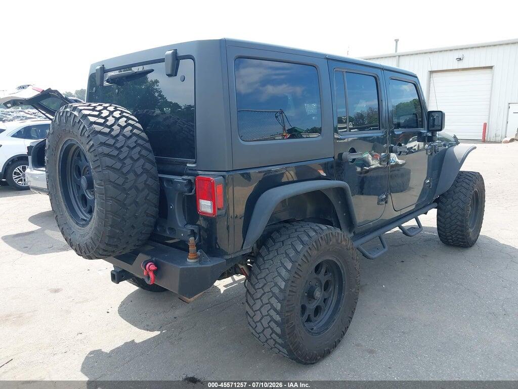 1C4BJWDG5EL281069 2014 JEEP WRANGLER UNLIMITED photo no. 4