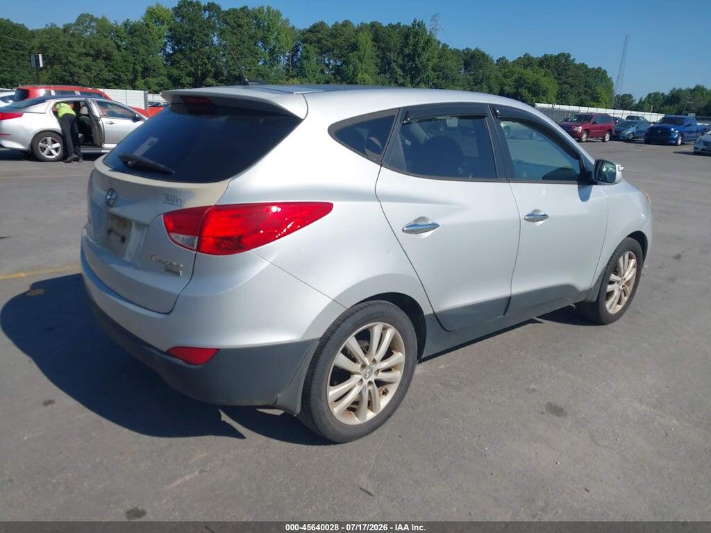 KM8JU3AC4DU666159 2013 HYUNDAI TUCSON photo no. 4