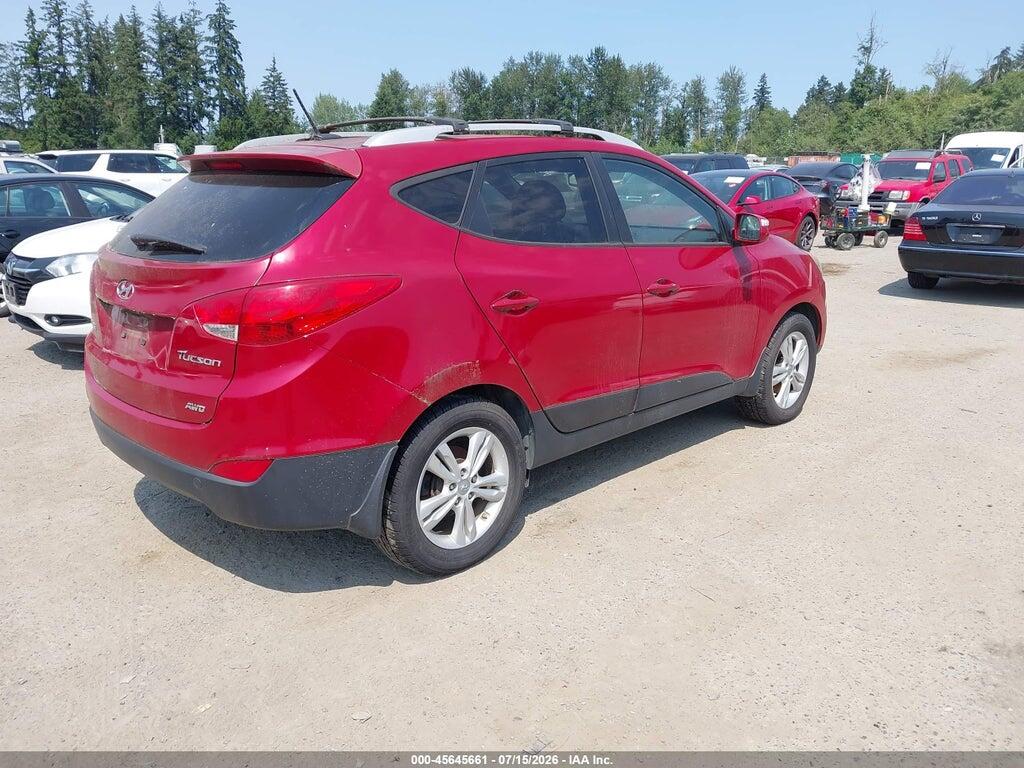 KM8JUCAC6CU543705 2012 HYUNDAI TUCSON photo no. 4