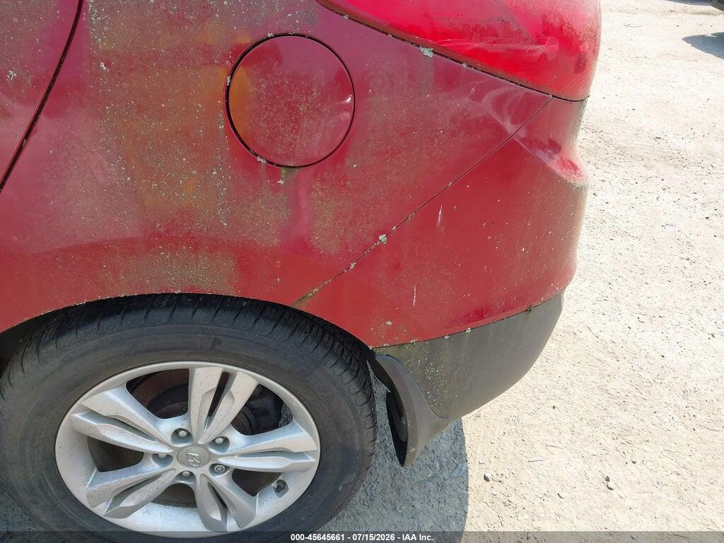 KM8JUCAC6CU543705 2012 HYUNDAI TUCSON photo no. 6