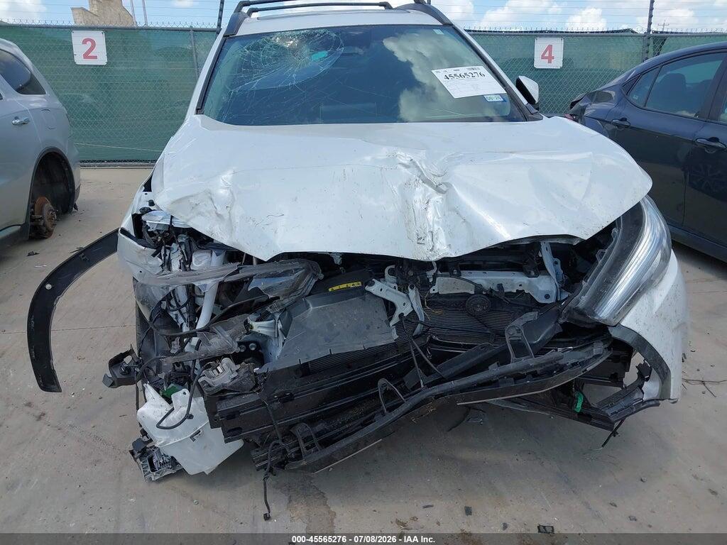 7MUDAAAG1RV103296 2024 TOYOTA COROLLA CROSS photo no. 6
