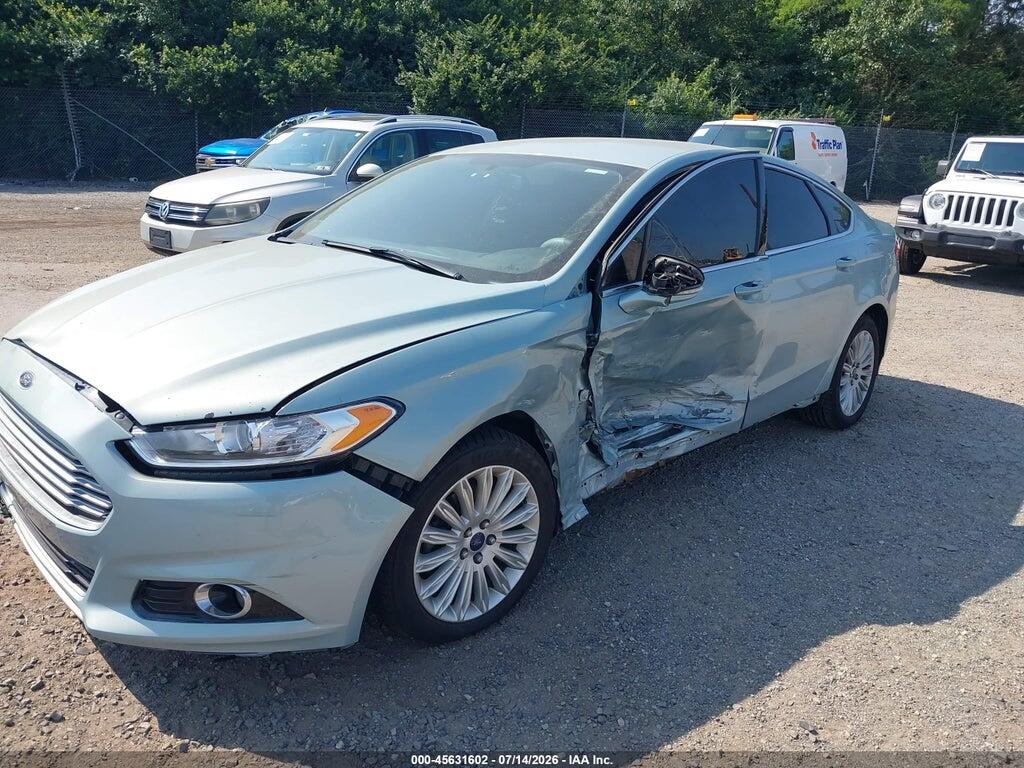 3FA6P0LU5ER135198 2014 FORD FUSION HYBRID photo no. 2